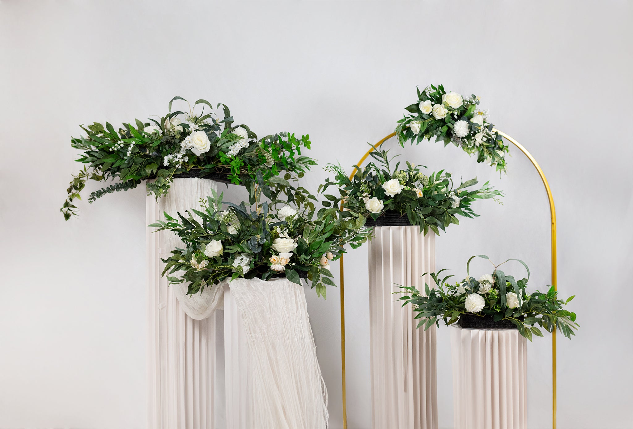 Set of Four White Cylindrical Pedestal Stand