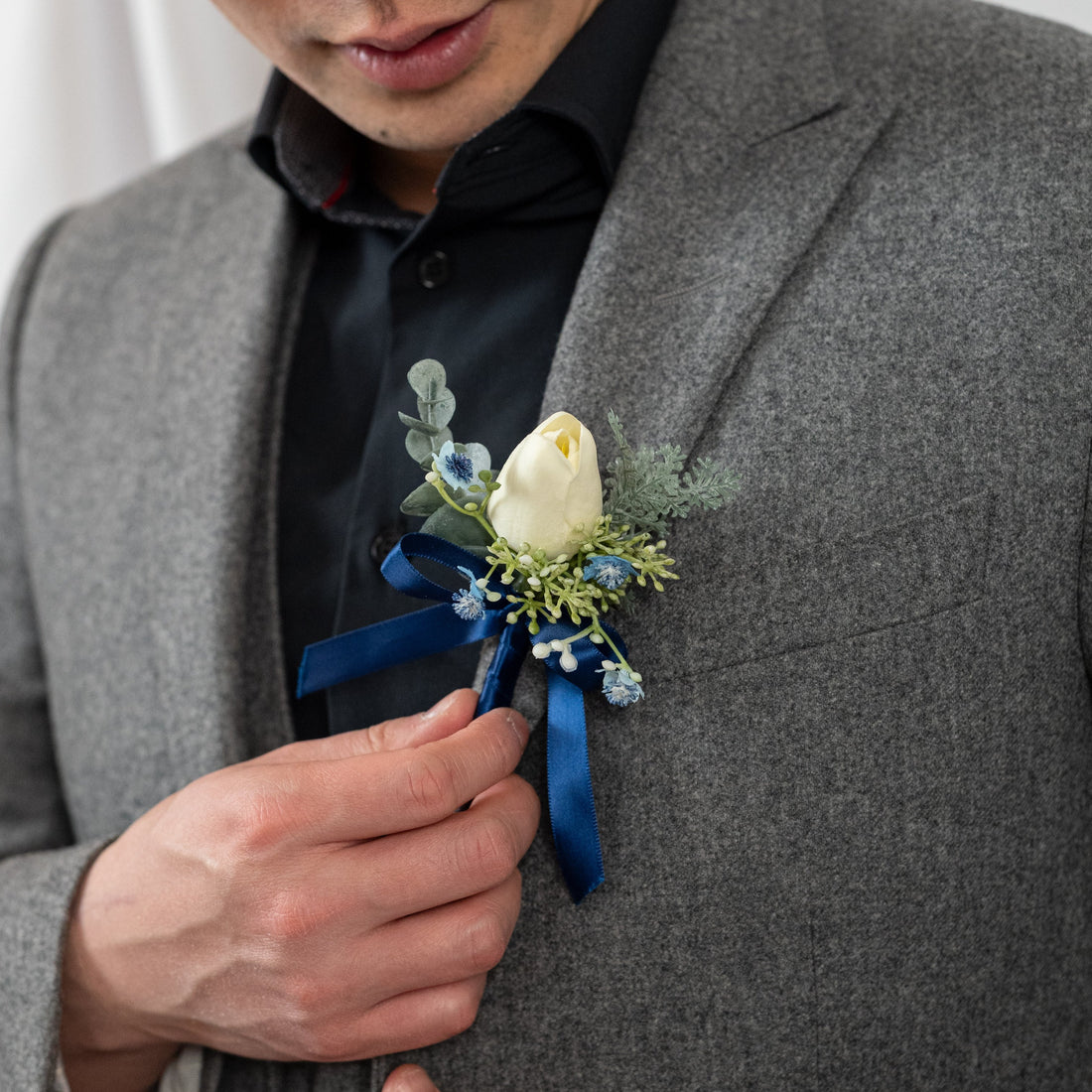 Tranquil tulip boutonniere