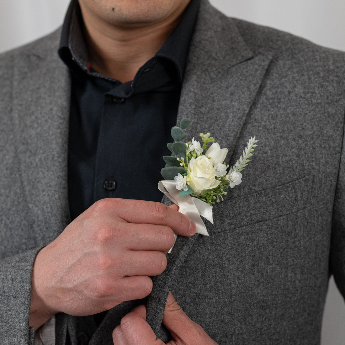 Classic white rose boutonniere