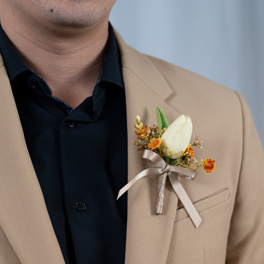 Harmony in blossom boutonniere