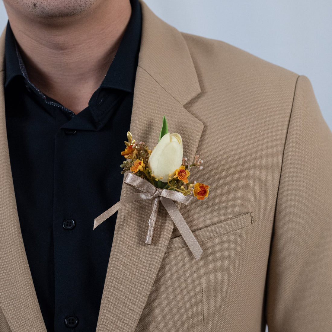 Harmony in blossom boutonniere