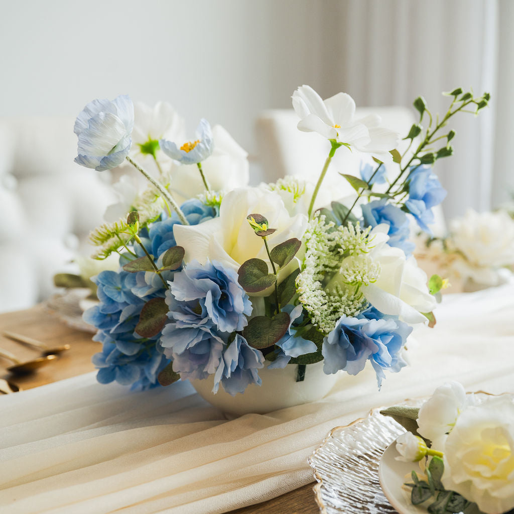 Ocean Breeze table faux (artificial) flowers  on a table set up for a special event.
