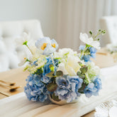 Ocean Breeze table faux (artificial) flowers  on a table set up for a special event.