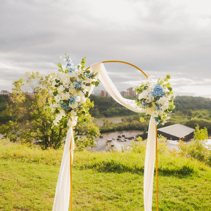 Decorative Ocean Breeze arch duo on an arch frame and sash set against a scenic background near the River Valley in Edmonton, Alberta.