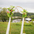 The Wildest Dreams two-piece arch faux (artificial, silk, and real touch) flowers on an arch frame.