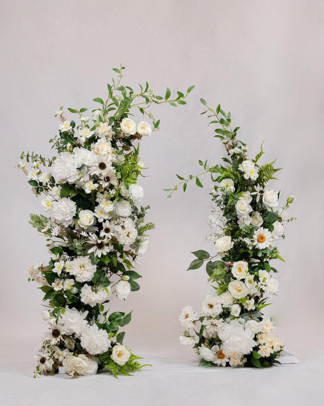 Enhance your event with this two-piece set featuring white artificial floral elements—peonies, roses, camellias, daisies, and carnations. Perfect for rentals in Edmonton, Sherwood Park, Leduc, St. Albert, it seamlessly blends with other decor, bringing effortless grace and elegance to any space