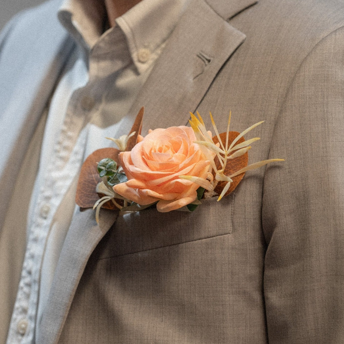 Rosy Sunset Groomsmen Boutonniere