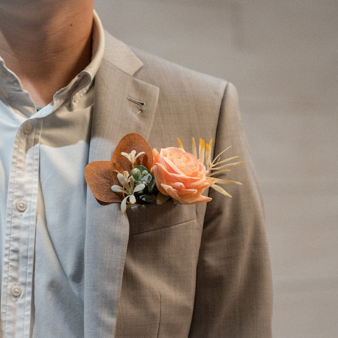 Rosy Sunset Groomsmen Boutonniere