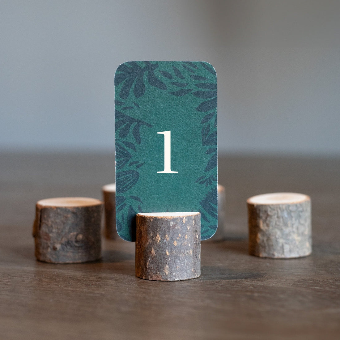 Rent wooden table card holders, perfect for a rustic touch in Edmonton, Sherwood Park, Leduc, St. Albert events. Ideal for displaying signs at tables, catering stations, and beyond, seamlessly infusing nature into your decor.