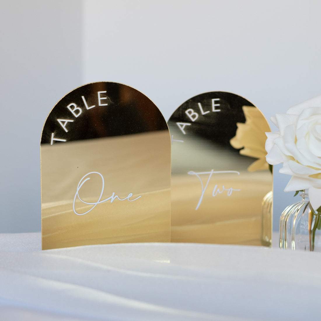 Gold arch acrylic table number sign